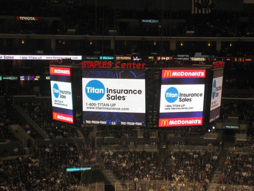 Staple Center In-Stadium jumbotron ad during game for Titan Insurance sales contact information