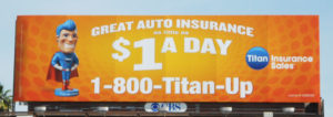 Titan Insurance $1 a day billboard ad with superhero wearing blue suit and red cape bobble head