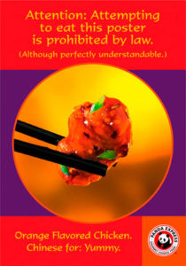 Up-close image of chopsticks holding a piece of orange chicken in a Panda Express print ad