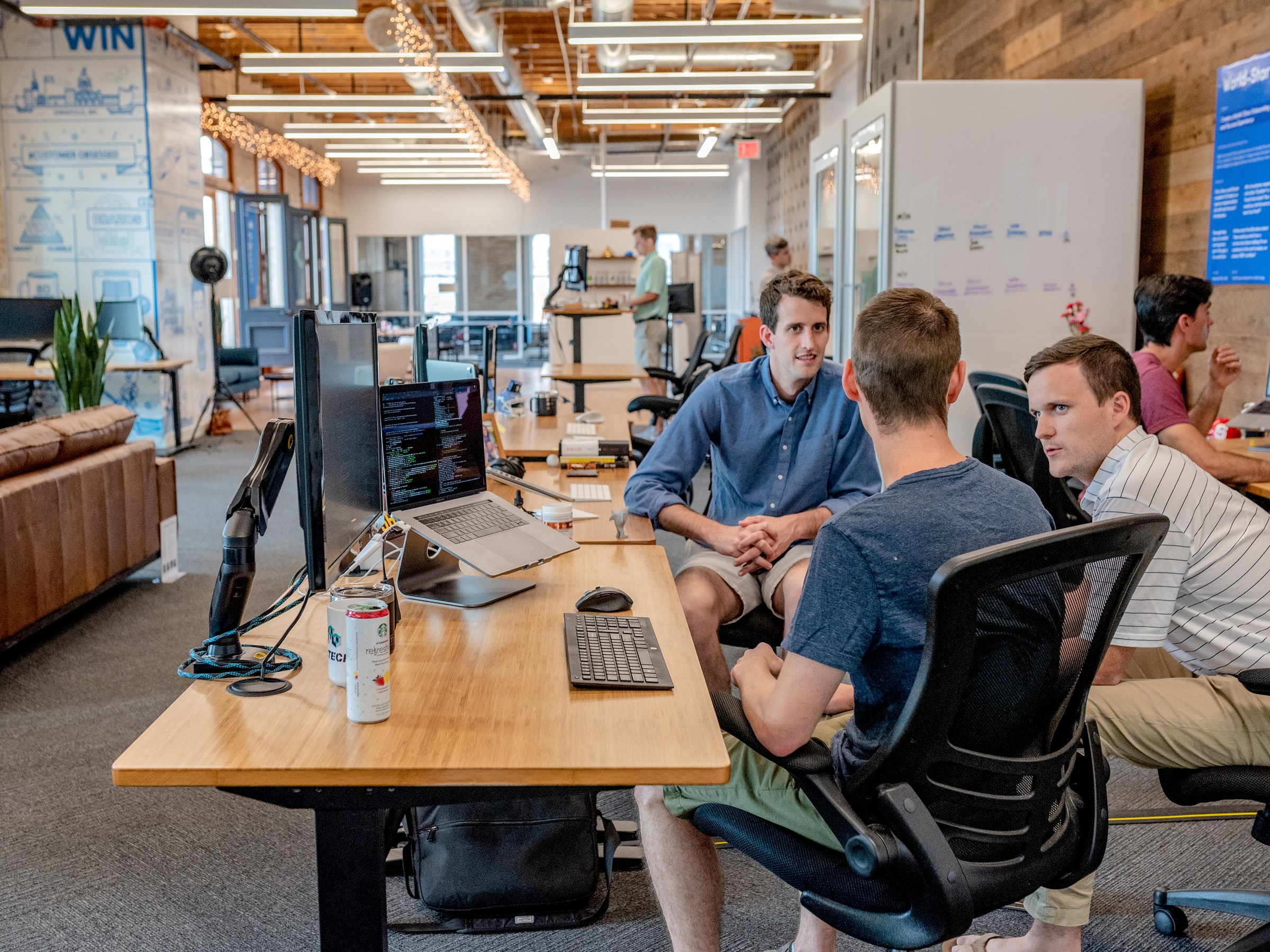 Men sitting in an office talking